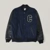 USED CARHARTT VARSITY BOMBER - NAVY/BLACK 1 USED CARHARTT VARSITY BOMBER - NAVY/BLACK -BARBOUR Shop U V August172022 189 1024x1024@2x